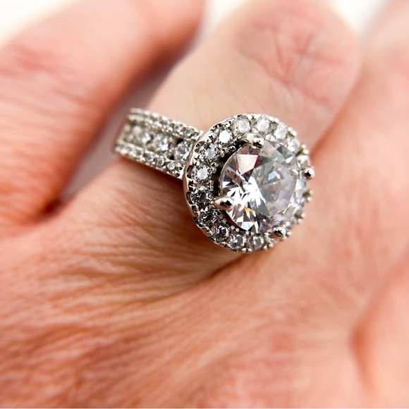 Round Cut Solitaire Halo CZ Ring with Pave and Round Cut Sides. Size 7. - Picture 9 of 9